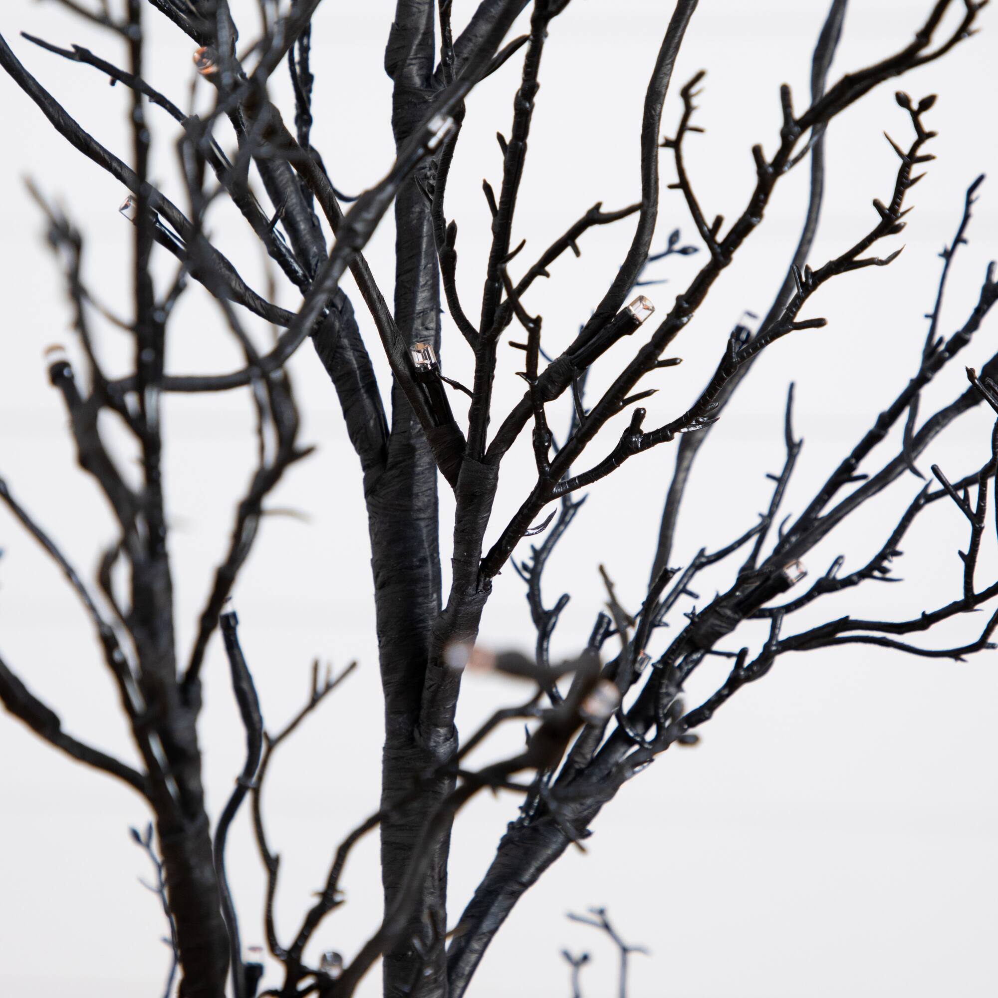 4ft. Orange & Purple LED Pre-Lit Halloween Deluxe Black Twig Artificial Fall Tree